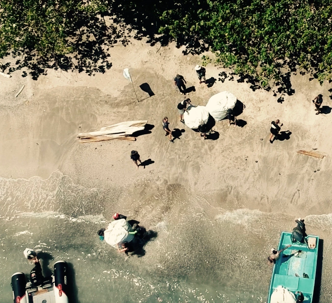 Aerial view of BIONIC recovery team collecting material on Costa Rica's Pacific coast
